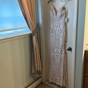 Formal sequined tan dress fitted with slight flare